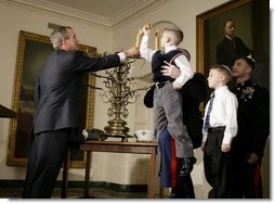 President George W. Bush helps light the Menorah at the White House.